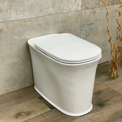 The New Yorker 561801 Унитаз приставной безободковый, глянцевый белый